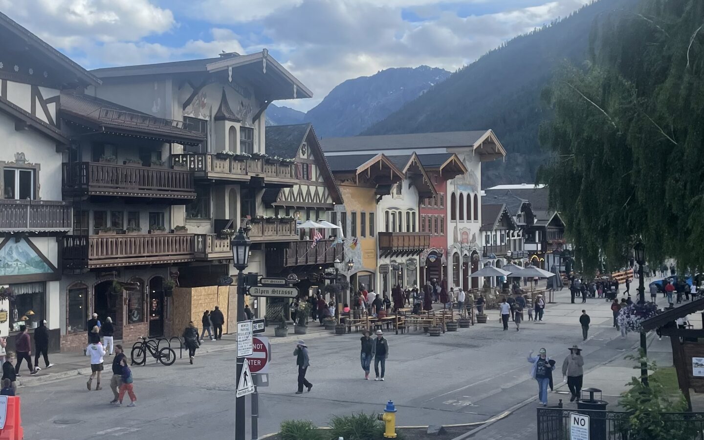 Main street in Leavenworth, Washington, with Bavarian-style buildings and mountains in the background