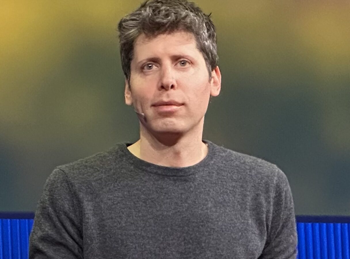 OpenAI CEO Sam Altman speaking on stage at TED in April 2025