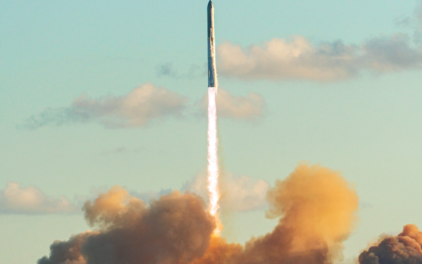 SpaceX Starship lifting off from Starbase during a flight test