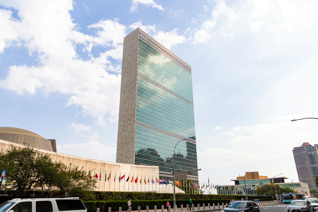 United Nations headquarters building in New York with member-state flags