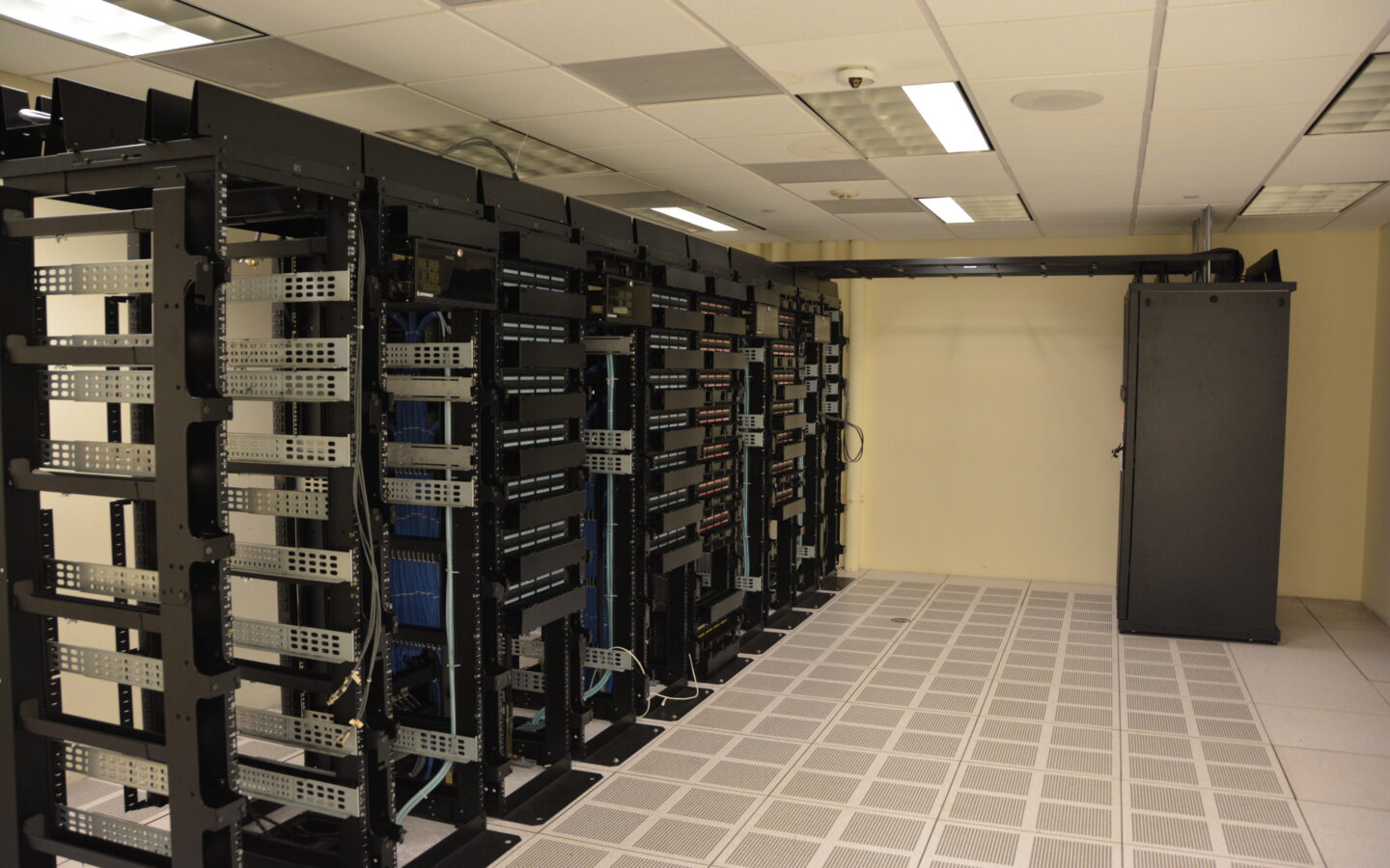 Rows of server racks inside a data center